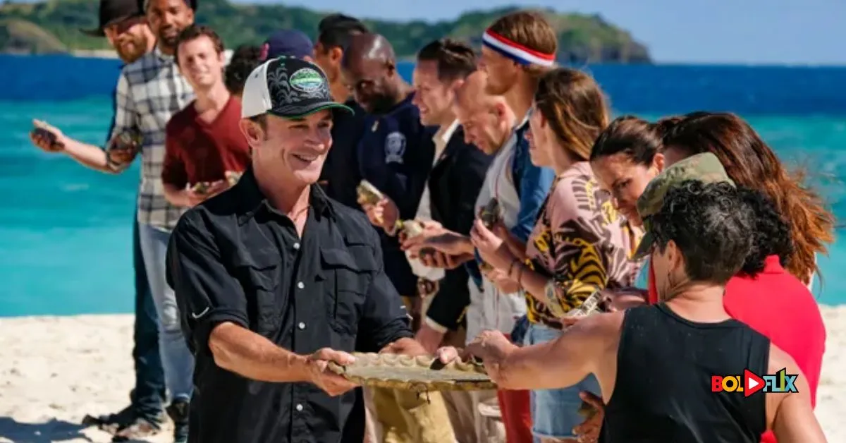 Jeff Probst hosting Survivor with the contestants in the background.